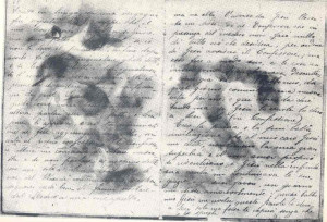 gambar close up dari buku harian st. gemma yang coba dibakar oleh iblis.